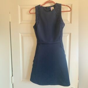 Navy A-line mini dress with lace detail